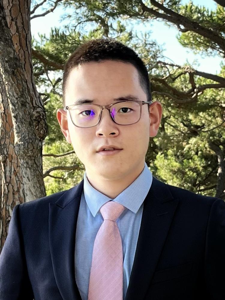 Haochen Fu in a suit